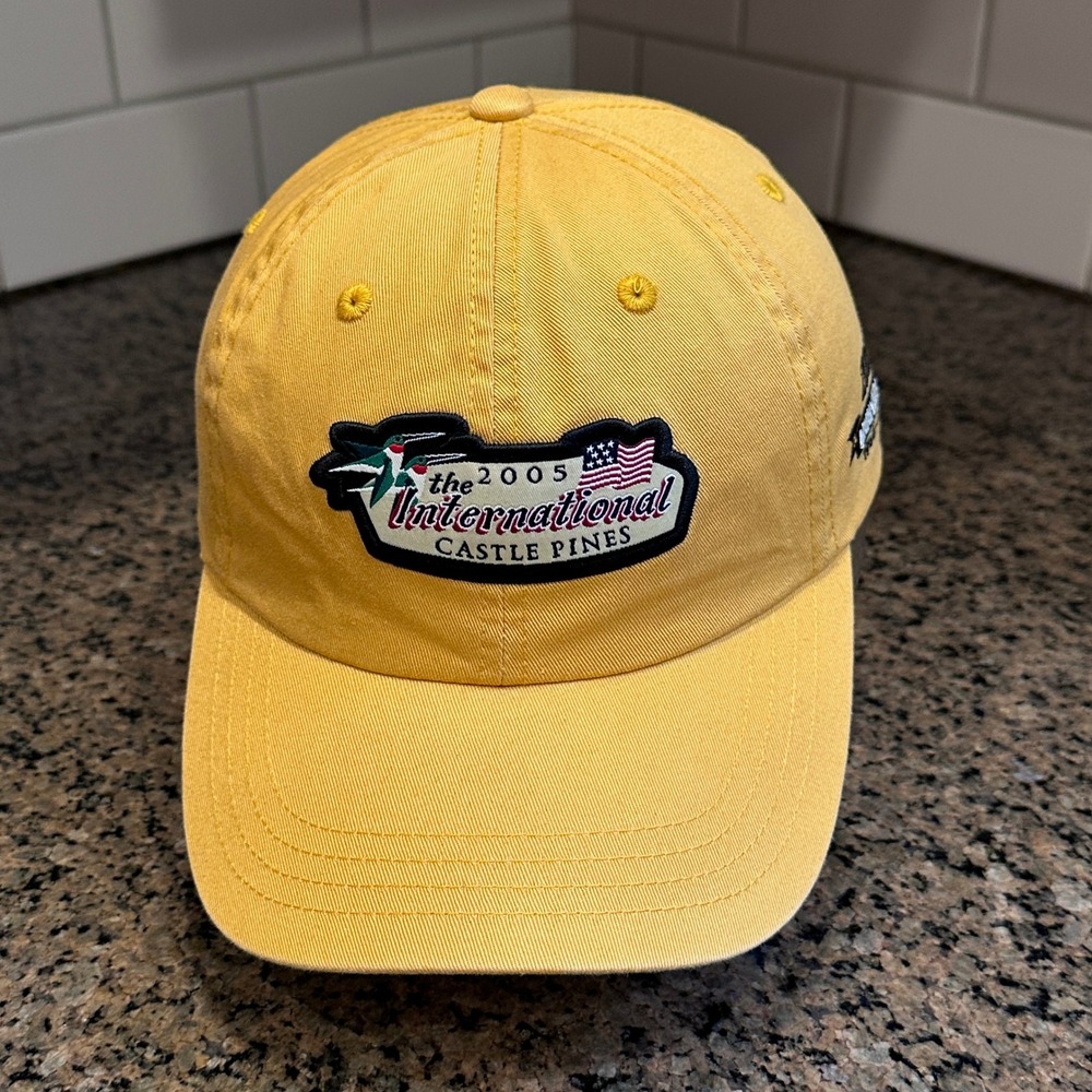 The International Castle Pines Imperial Dad Golf Hat Unisex Yellow Cotton